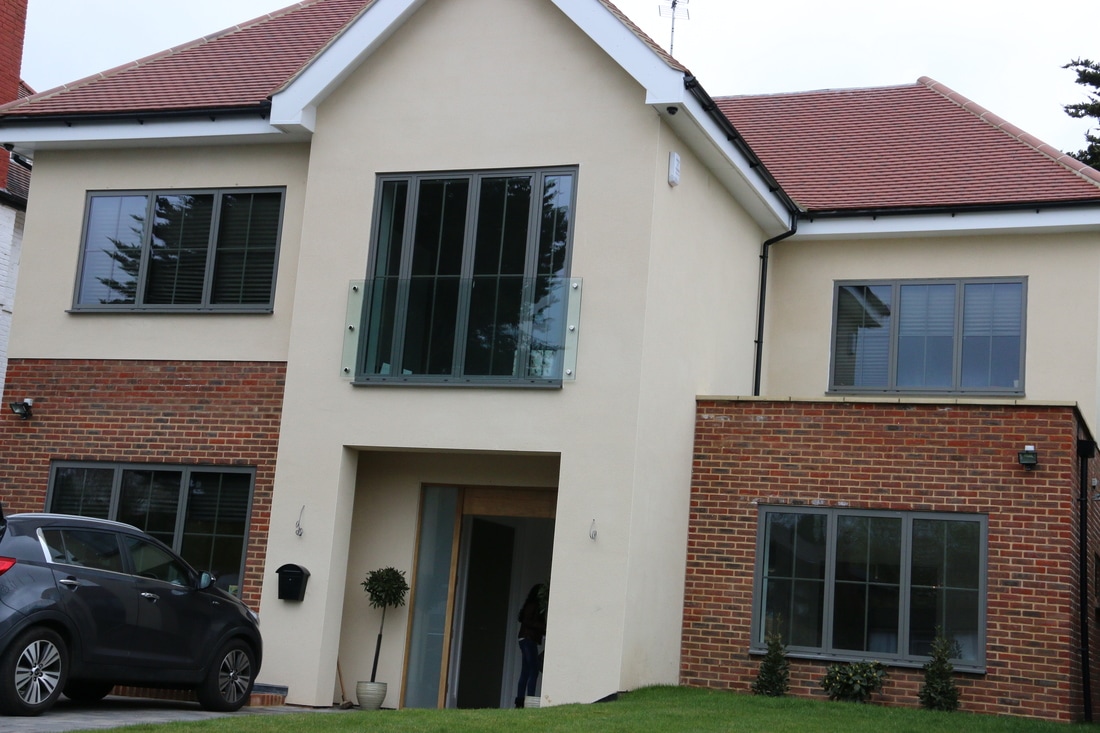 Grey aluminium double glazed windows on a home near Cobham – Inspired Glazing